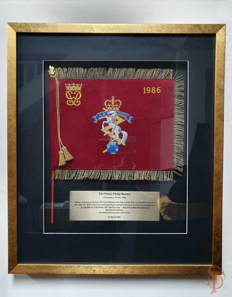 Framed Military Memorabilia with engraved plaque